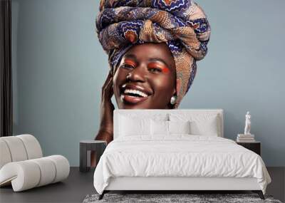 Head scarf, black woman laugh and portrait with African beauty and makeup in a studio. Isolated, grey background and traditional fashion with a female model pride with culture cosmetics and jewelry Wall mural