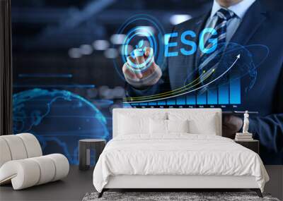 ESG environmental social governance business strategy investing concept. Businessman pressing button on screen. Wall mural