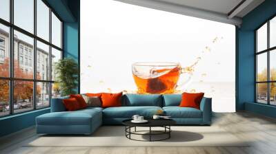 Cup of tea with a bag. Tea drink splash Wall mural