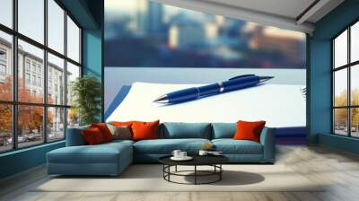 Notepad on a table with pen before meeting, blue tone, business concept with copy space Wall mural