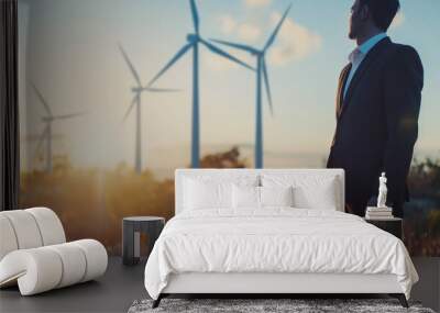 A businessman analyzes a graph showing market trends in renewable energy investments against a clean and uncluttered background. with natural light, soft shadows, and copy space Wall mural