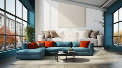 Picture a transparent wall art mock-up of picture fame inside a contemporary living room with a sofa and a plant in a vase on a white wall. Wall mural