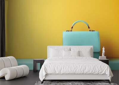 A female stylish bag isolated in the pastel yellow background Wall mural