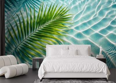 Top view of tropical leaf shadow on water surface. Shadow of palm leaves on white sand beach. Beautiful abstract background concept banner for summer vacation at the beach. Wall mural