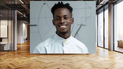 Realistic hyper-detailed portrait of a cheerful young African man engineer smiling, his face reflecting pride and determination in solving complex engineering challenges. Background images that Wall mural