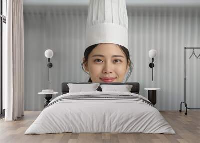 Realistic hyper-detailed portrait of a cheerful young Asian woman chef smiling, capturing her expertise and enthusiasm for culinary arts and exceptional food preparation. Background images that Wall mural