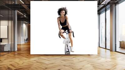 A cheerful cyclist in a cycling suit is a curly-haired millennial woman riding a rest, training bike. Transparent background, isolate. Wall mural