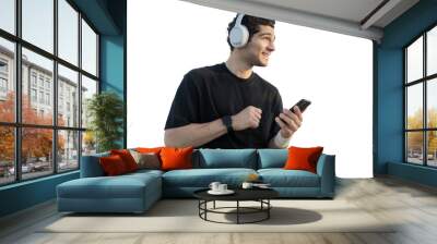 A man listens to music with headphones on a transparent background. Wall mural