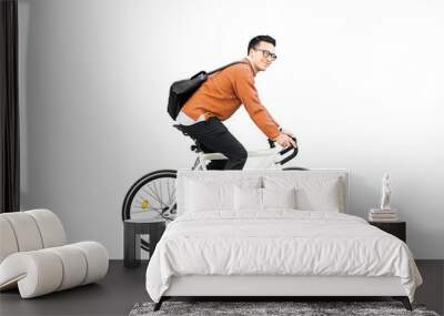 A young man riding a bicycle to work with a briefcase. Transparent background, png. Wall mural