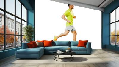 Male athlete runner in running shoes training in a T-shirt for sports, cut out Wall mural