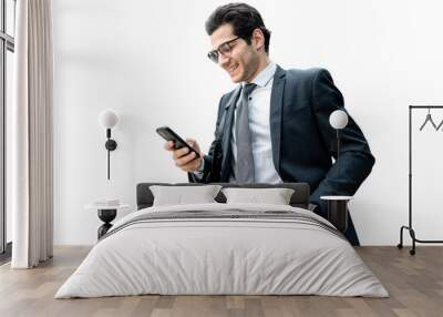 The director is a man in a business suit using a phone to surf the Internet, isolated transparent background. Wall mural