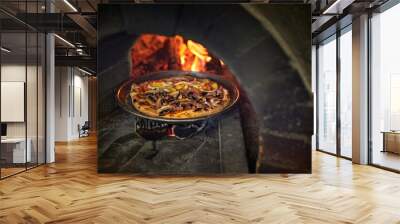 Pizza in a bread wood fired oven Wall mural