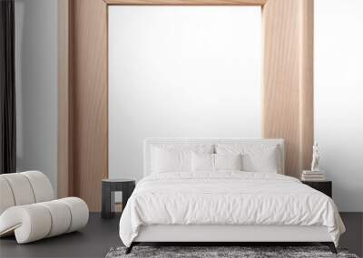 A minimalist light wooden picture frame with clean lines and a white background, illuminated by natural light Wall mural