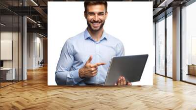 Smiling man holding and pointing at laptop on transparent background Wall mural