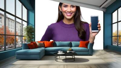 Smiling woman holding a smartphone on transparent background Wall mural