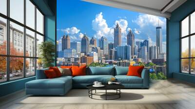 Downtown Atlanta Skyline showing several prominent buildings and hotels under a blue sky Wall mural