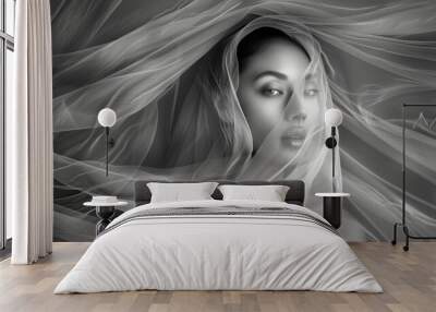  Ethereal portrait of a woman with flowing fabric veil on a dark background.. Wall mural