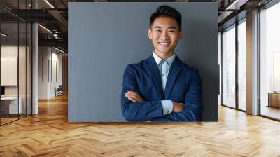 Confident Asian Businessman in a Blue Suit Wall mural