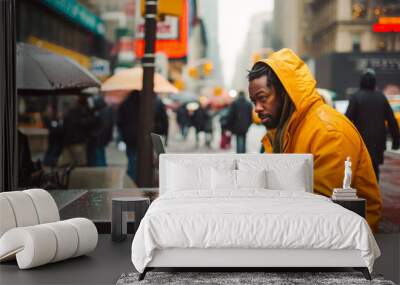 Black man with a orange raincoat using a laptop in the middle of New York while raining. Student or freelancer lifestyle. High quality generative ai Wall mural