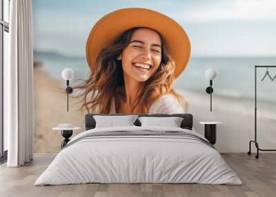 Blissful happy woman on a beach vacation, smiling and enjoying Wall mural