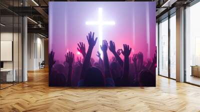 Christian worshipers raising hands up in the air in front of the cross Wall mural