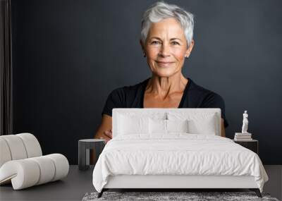 Portrait of a fit senior woman citizen, displaying strength and an active lifestyle, important to keep in shape even at age Wall mural