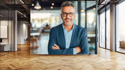 Portrait of a proud smiling confident middle aged hispanic businessman in office. Elegant, stylish, corporate leader, successful CEO executive manager. Wearing glasses and business suit Wall mural