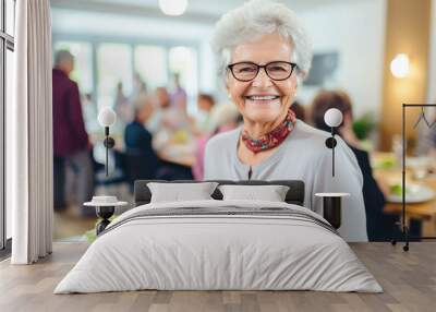 Portrait of a senior woman in a retirement home happily enjoying a healthy lunch. Presentation of a healthy lifestyle of well-being and contentment even at an age Wall mural