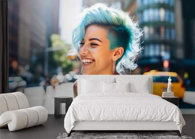 Portrait of millennial girl with blue hair and tattoos, smiling on sunny street in New York City. Concept of casual, carefree, connectivity, candid Wall mural