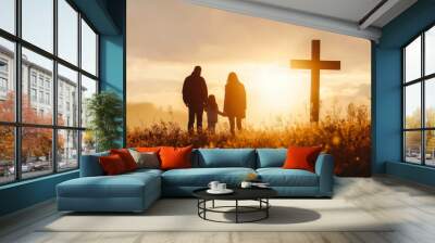 Silhouette of family looking for the cross of Jesus Christ on autumn sunrise background. Easter Sunday concept. Wall mural