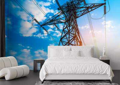 Silhouette of High voltage electric tower on sunset time background Wall mural