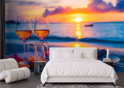 Summer love. Romantic sunset dinner on the beach. Table honeymoon set for two with luxurious food, glasses of rose wine drinks in a restaurant with sea view Wall mural