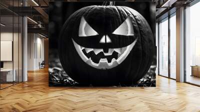 A black and white image of a jack-o'-lantern with a single, menacing eye perfect for Halloween Wall mural