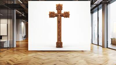 Christian religious wooden cross on white background. Christian religious crucifix on white background. Topics related to the Christian religion. Topics related to death. Object of worship and belief, Wall mural