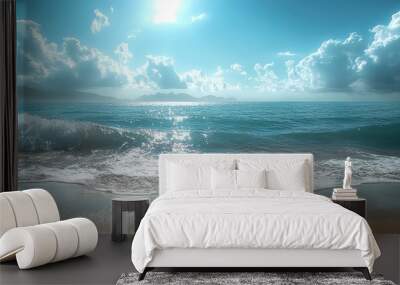 A radiant coastal scene with glimmers of sunlight reflecting off the waves Wall mural