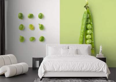 creative food / nutrition / diet concept with fresh green peas in a group and single open pea pod, minimalist colorful graphic layout Wall mural