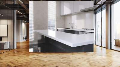 Modern black kitchen island, counter and cabinet with white marble countertop in sunlight from window blinds on beige marble tile wall and houseplant Wall mural