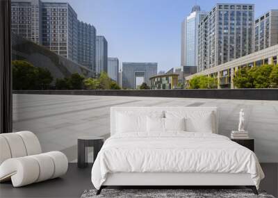 Panoramic skyline and modern business office buildings with empty road,empty concrete square floor Wall mural