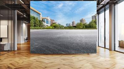 Panoramic skyline and modern business office buildings with empty road,empty concrete square floor Wall mural