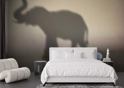 concept of hidden potential. a paper figure of a mouse that fills the shadow of an elephant. 3d illu Wall mural