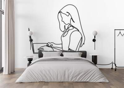 One line woman writing and study with help laptop.Continuous one line drawing of a woman. Business concept. Beautiful woman sits on the floor and holding laptop isolated on a white background. Vector  Wall mural