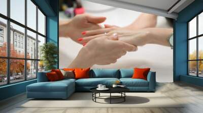 Woman getting nail manicure Wall mural