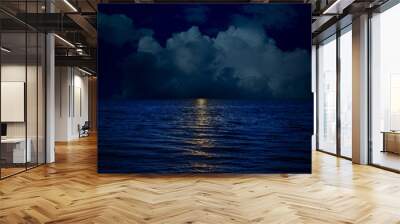 full moon over clouds and dark water with reflections Wall mural