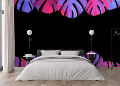 Bright purple and pink monstera leaves border frame on black abstract background Wall mural