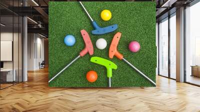 Four Mini Golf Putters with Balls Wall mural