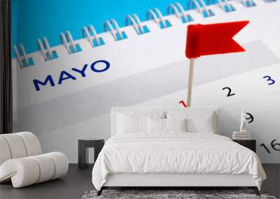 Flag shaped thumbtack marking International Workers' Day Wall mural