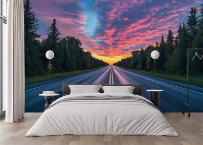 Picturesque road along the forest at sunset Wall mural