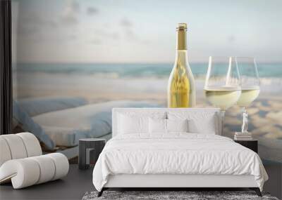 White wine with blank label on the table a sandy beach with the sunset ocean in the background Wall mural