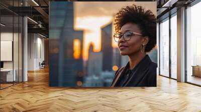 Happy wealthy rich successful black businesswoman standing in big city  Wall mural