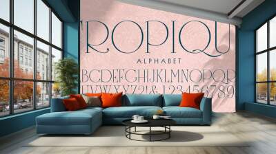 Tropique is an elegant extra light serif alphabet with a posh vibe and tropical overtones. Wall mural